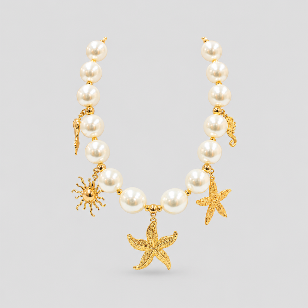 Collar + topos aura marina perla dorado