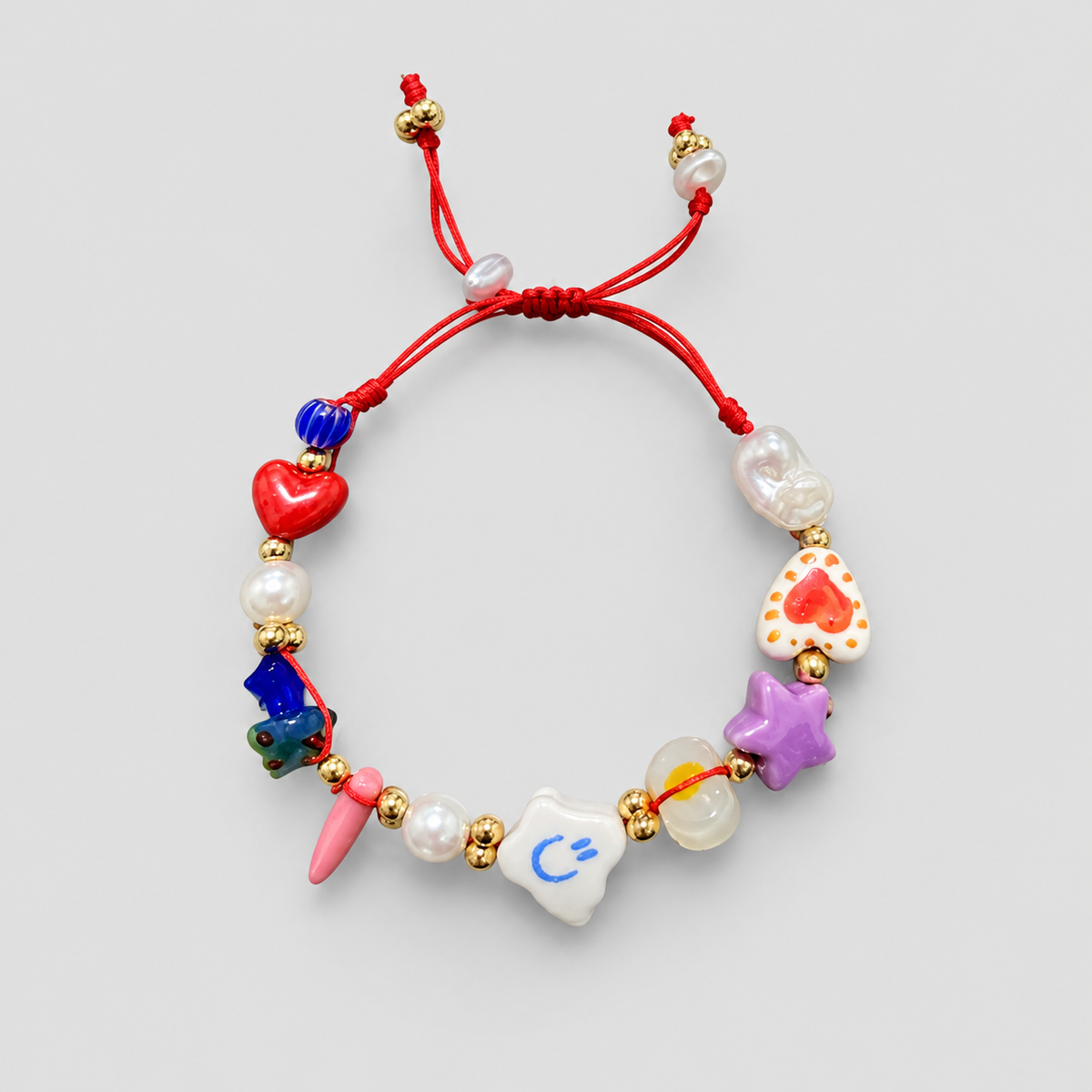 Pulsera corazón nube roja