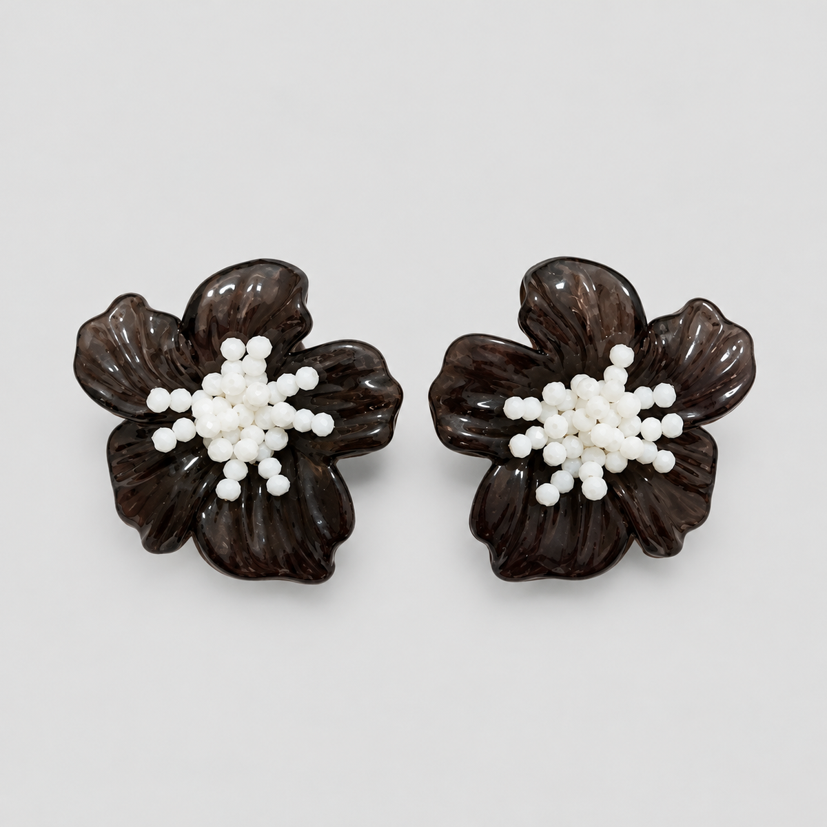 Aretes flor nacar negro