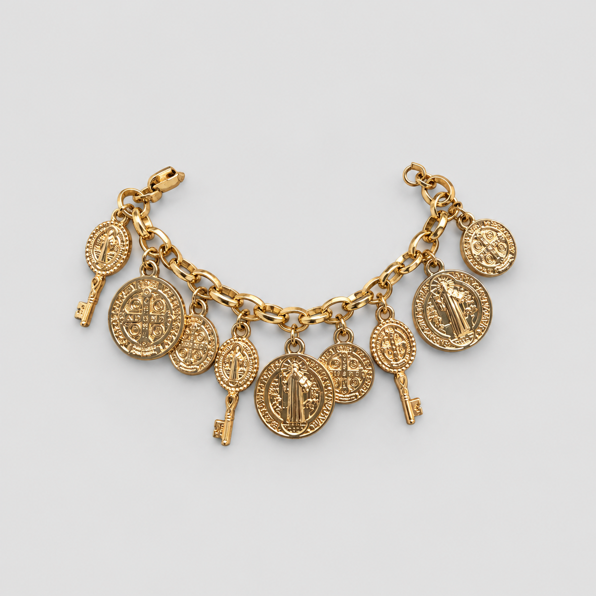 Pulsera monedas san benito dorada