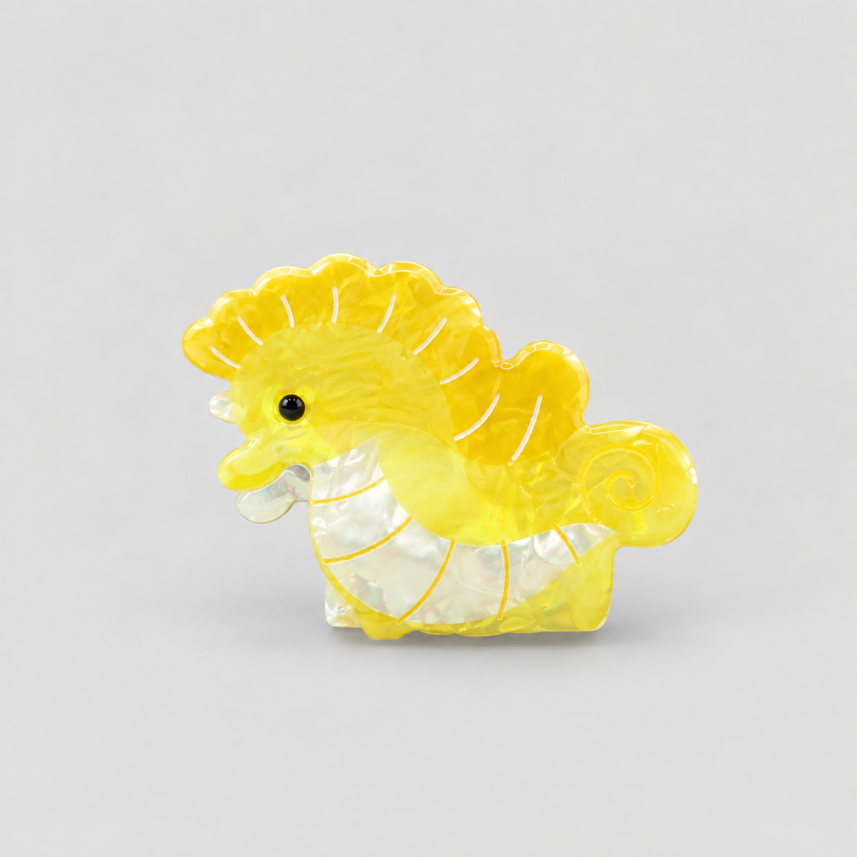Caimán nacar caballo de mar amarillo