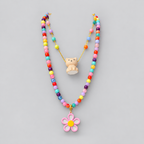 Collar doble + topo flor y gato blanco