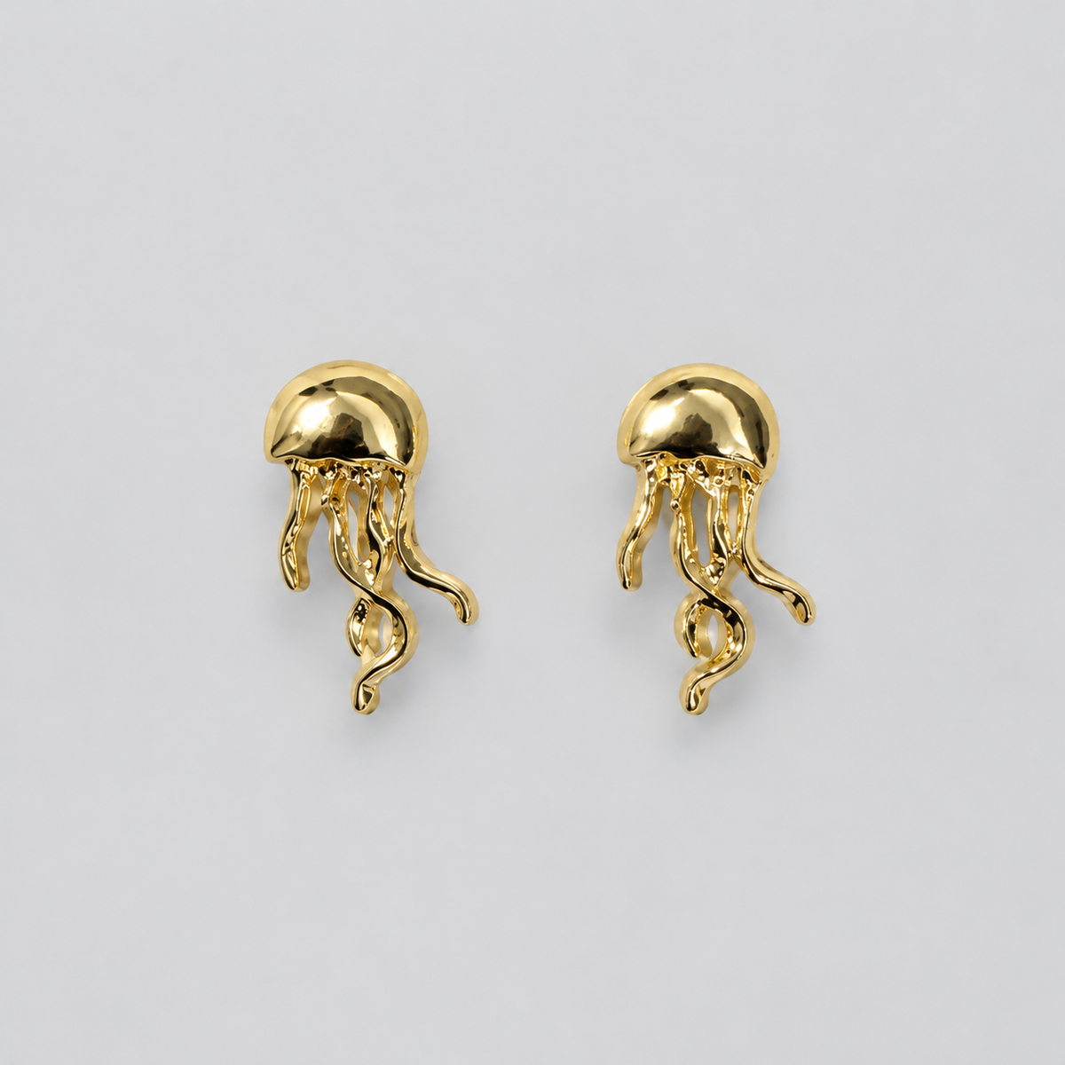 Aretes medusa dorado